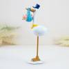 Figura para bautizo Cigüeña con niño - Decoración De Bautizo